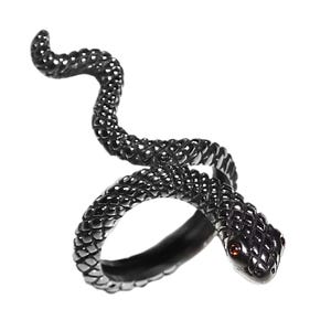 May include: A black snake ring with a red eye. The snake is coiled around the ring band.