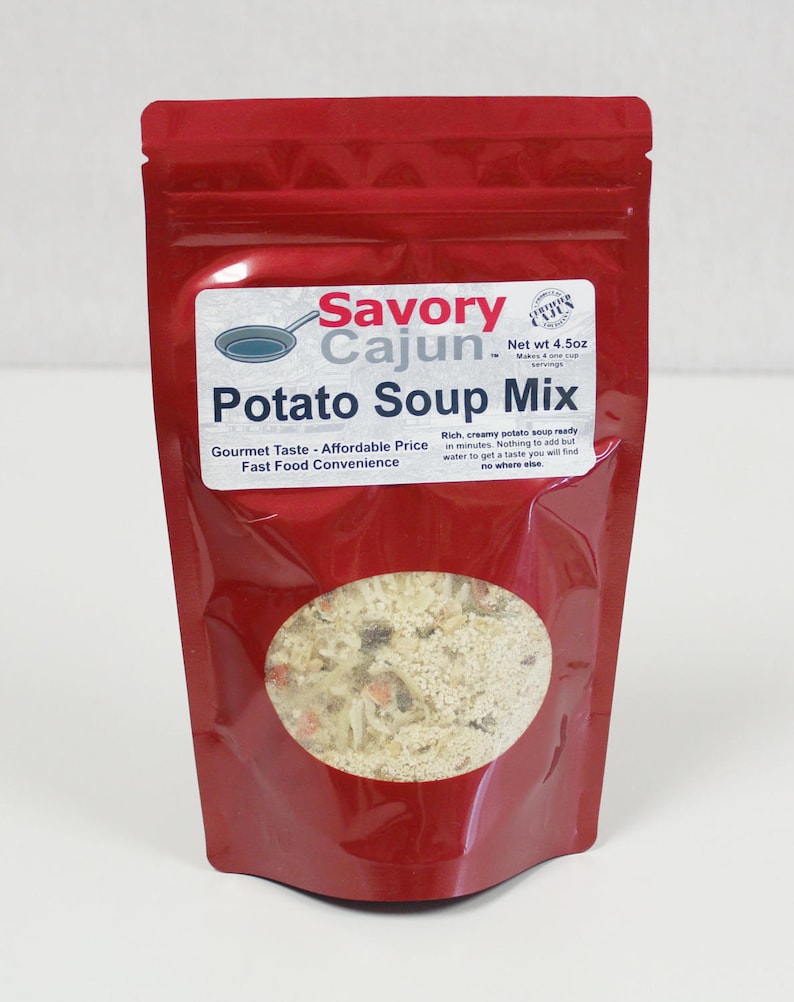 May include: A red pouch of Savory Cajun Potato Soup Mix. The label includes the text "Gourmet Taste - Affordable Price" and "Fast Food Convenience." The pouch has a clear oval window showing the soup mix. The net weight is 4.5oz and makes 4 one-cup servings.