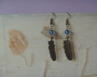 feather earrings, handmade earrings with antique effect brass feather pendants and blue beads