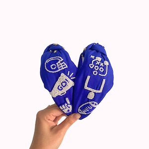 Diadema con iconos del día del juego azul y blanco // Fútbol