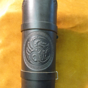 Leather strapped dragon embossed armguard/bracer