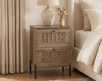 May include: A wooden nightstand featuring two drawers with a woven-style textured front panel and small black circular knobs. The nightstand is supported by four thin, straight black metal legs and has a light brown wood grain finish.