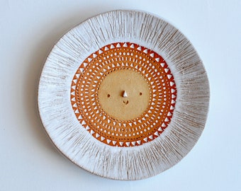 Small round textured sun face //small wall plate // trinket dish // white glaze