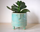 Small tripod planter in turquoise glaze