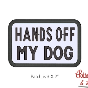 May include: Black and white embroidered patch with the text "HANDS OFF MY DOG" on a white background. The patch is 3 inches by 2 inches.