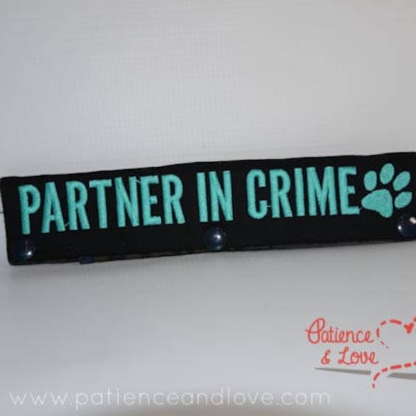 1 Partner in Crime with paw print, leash sleeve, snap on, 2 lines of text on each side