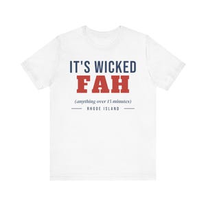 May include: A white short-sleeve t-shirt featuring the text IT'S WICKED FAH in blue and red, followed by the parenthetical text (anything over 15 minutes) and the words RHODE ISLAND centered below with horizontal lines on each side.