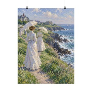 May include: An oil painting depicting figures in long white dresses walking along a grassy coastal cliff path. They carry white parasols under a bright blue sky. The ocean waves crash against the rocky shoreline below, with distant sailboats.