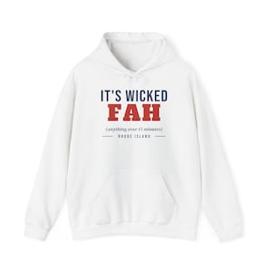 May include: A white hooded sweatshirt featuring the text IT'S WICKED FAH in dark blue and red, with the smaller text (anything over 15 minutes) and RHODE ISLAND below. The garment includes a front kangaroo pocket and matching white drawstrings.
