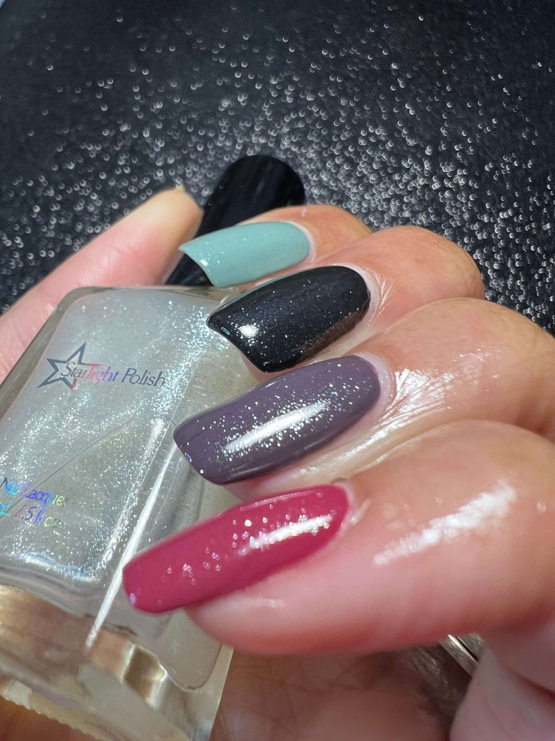 Starlight Polish Diamond over light green, black, purple, and pink - @crazy4polish0319