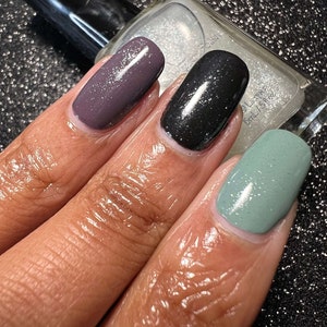 Starlight Polish Diamond over light green, black, and purple - @crazy4polish0319