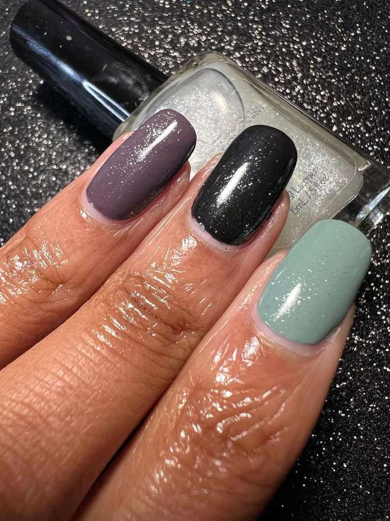 Starlight Polish Diamond over light green, black, and purple - @crazy4polish0319