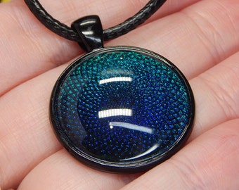 Kelpie Pendant: Night Blossom, Teal to Violet Color Shifting Shimmer, Multichrome, Round Black Glass Cabochon Necklace