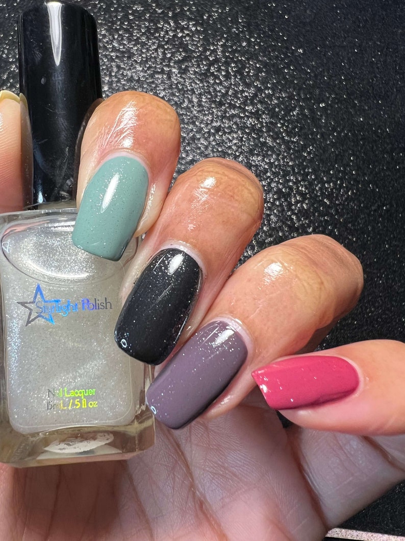 Starlight Polish Diamond over light green, black, purple, and pink - @crazy4polish0319