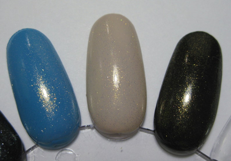 Starlight Polish Topaz over blue, tan, and black