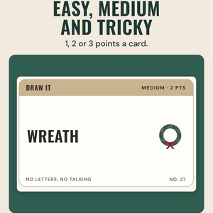 A Christmas pictionary card reading Wreath, medium, 2 points, with a wreath drawing, under the headline Easy, medium and tricky.