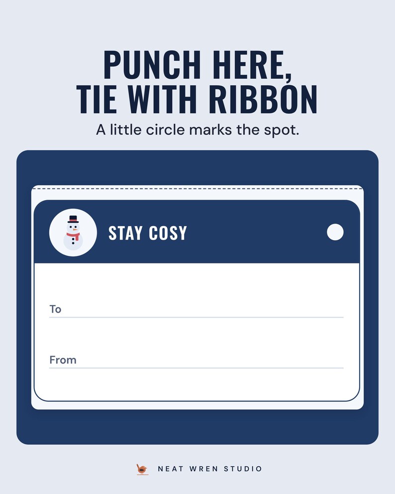A navy Stay cosy gift tag with a snowman and a punch-hole circle, under the headline Punch here, tie with ribbon, and the line A little circle marks the spot.