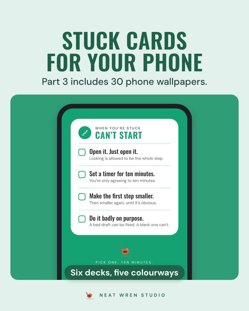A phone showing one of the 30 stuck-card wallpapers from Part 3: the green Can't start card with four small first steps.