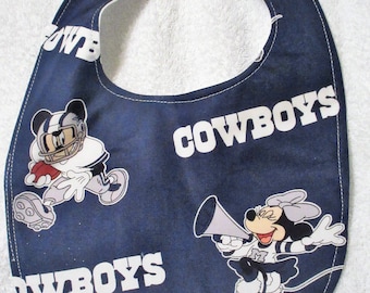 Mickey,Minnie Mouse and NFL Dallas Cowboys togeather on this baby bib waterproof lining.