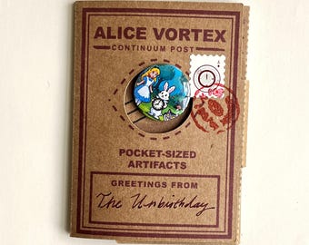 Alice Vortex Unbirthday Pocket Souvenir Kit, Mini Map Scroll, Stickers, Pin, Fortune Card - a small collection of Artifacts from the Vortex