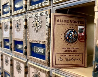 Alice Vortex Wallspeak Pocket Souvenir Kit, Mini Map Scroll, Stickers, Pin, Fortune Card - a small collection of Artifacts from the Vortex