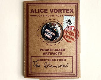 Alice Vortex Glimmerward Pocket Souvenir Kit, Mini Map Scroll, Stickers, Pin, Fortune Card - a small collection of Artifacts from the Vortex