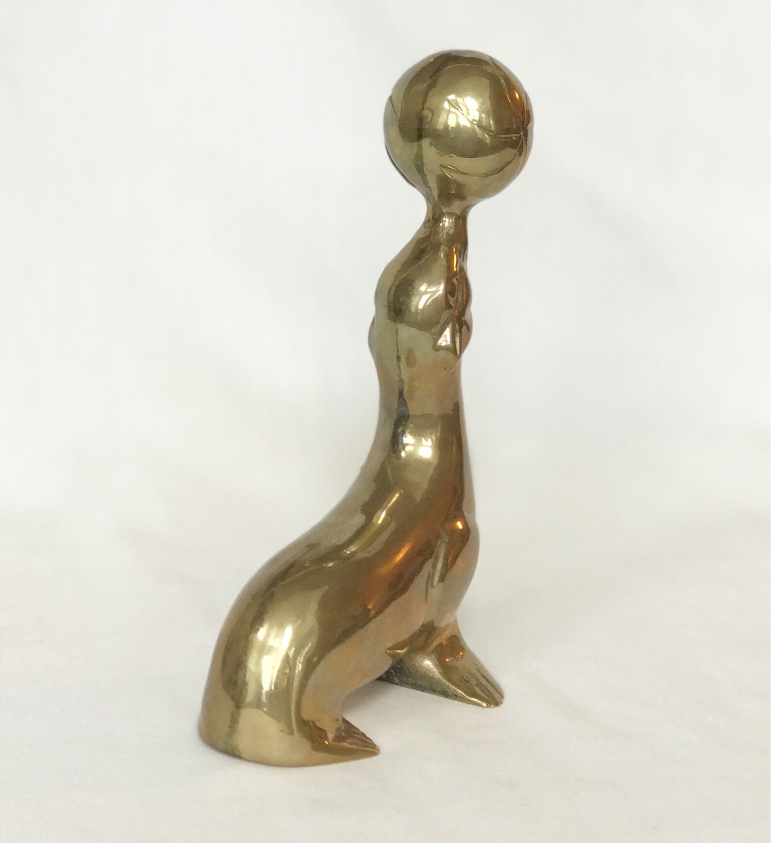 Solid brass seal statue balancing ball on nose Hollywood Etsy