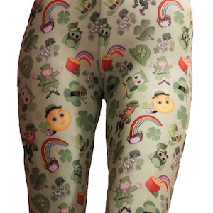 May include: Green leggings with a repeating pattern of shamrocks, rainbows, leprechauns, and the phrase "Lucky Me".