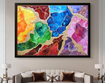 May include: A rectangular wall art piece featuring a vibrant, multi-colored abstract design with sections of yellow, green, blue, red, and purple. The segments are separated by raised, textured gold lines that create a geode-like effect.