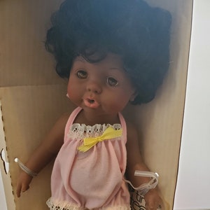 Black tiny tears doll best sale