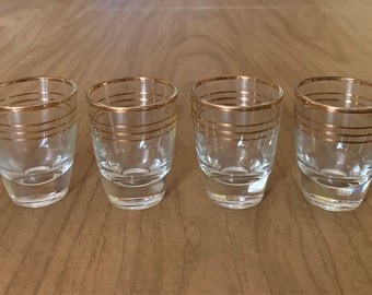 Vintage shot glasses - set of 4 - gold trim - 2 1/2" tall