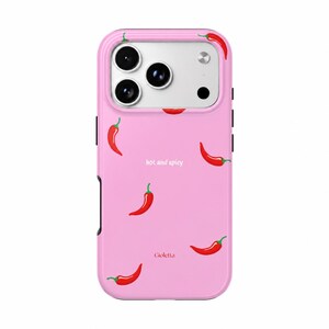 May include: A light pink smartphone case featuring a repeating pattern of small red chili peppers with green stems. The text "hot and spicy" is printed in white, and the brand name "Gioletta" is printed in red on the lower section.