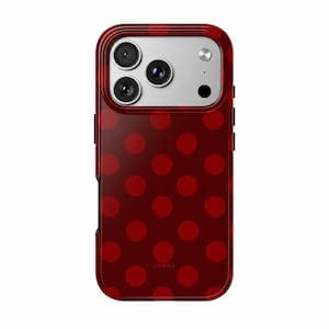 May include: A dark red smartphone case featuring a repeating pattern of slightly lighter red polka dots. The case has a rectangular cutout at the top for a triple-lens camera system and a flash. The word Gloletta is printed in small red letters.