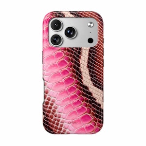May include: A smartphone case featuring a vibrant pink and dark brown snakeskin pattern. The top section includes a silver-toned camera cutout with three circular lenses and a flash. The brand name Gloletta is printed in small letters near the bottom.