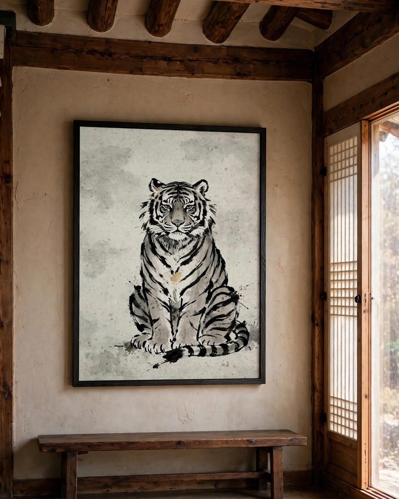 Korean tiger art print shown framed on the wall of a traditional hanok room above a low wooden bench (digital room mockup).