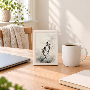 Ink koi print in the 4x6 inch size standing on a wooden desk next to a coffee mug; the frame shown is not included.