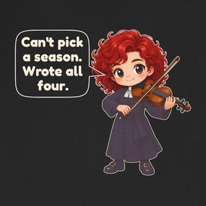May include: A black t-shirt featuring a cartoon illustration of a red-haired character playing a wooden violin. A speech bubble contains the text: Can't pick a season. Wrote all four. The character wears a dark purple long-sleeved robe with a white collar.