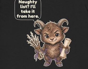 May include: A black t-shirt featuring a brown, furry, horned creature holding a bundle of birch twigs and a scroll. A speech bubble above the creature contains the text: Naughty list? I'll take it from here. The design is centered on the shirt.