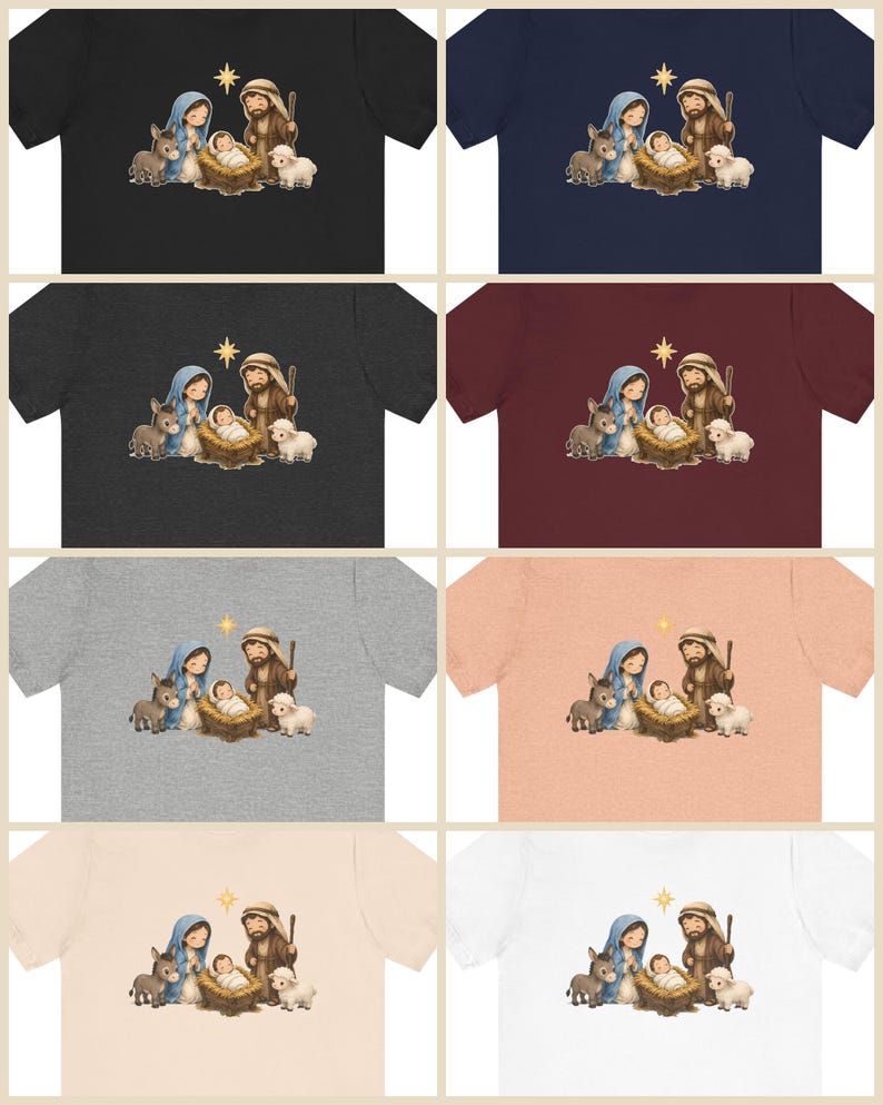 May include: A collection of eight short-sleeve t-shirts in various colors, each featuring a central graphic illustration of a nativity scene with a baby in a manger, a person in a blue head covering, a person with a staff, a donkey, a sheep, and a star.