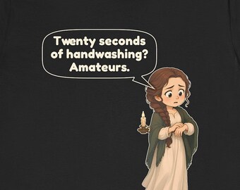 May include: A black t-shirt featuring a cartoon illustration of a person with long brown braided hair wearing a cream dress and dark shawl. The person holds a lit candle and a speech bubble reads: Twenty seconds of handwashing? Amateurs.