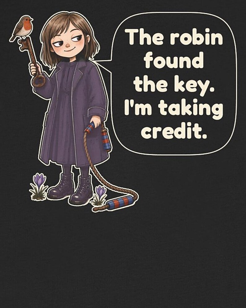 May include: A graphic illustration on a black background featuring a person in a dark purple coat holding a key with a robin perched on it. A speech bubble contains the text: The robin found the key. I'm taking credit. A rope with red and blue striped ends hangs down near purple flowers.
