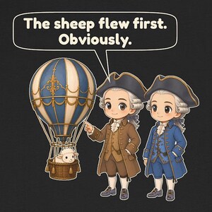 May include: A black graphic t-shirt featuring two figures in 18th-century attire standing next to a blue and white hot air balloon with a sheep in the basket. A speech bubble above them contains the text: The sheep flew first. Obviously.