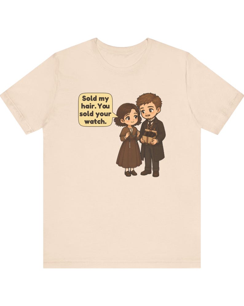 May include: A beige t-shirt featuring a cartoon illustration of a couple. The female character wears a brown dress, and the male character wears a dark suit. A speech bubble contains the text: Sold my hair. You sold your watch.