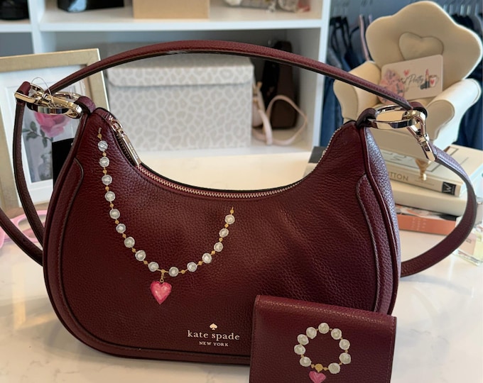 Lady in Red.  Hand painted shoulder bag and matching wallet.  Brand new Kate Spade pieces.