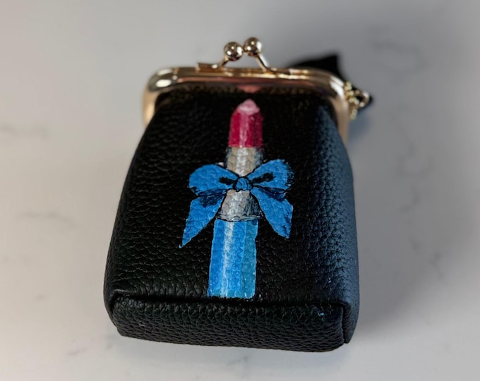 The Finishing Touch.  A perfect item to throw into your handbag to hold your favorite colors!