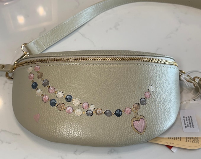 Pearls of Wisdom.  Nice size cross body in 100 leather!