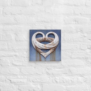 May include: A square wall art piece featuring two white, curved swan necks forming a heart shape against a blue background. The white swan figures have a weathered, distressed texture with visible brown rust-like streaks running downward.