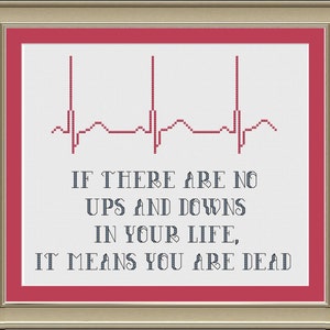 May include: A white background with a red heart rate monitor line and the text "IF THERE ARE NO UPS AND DOWNS IN YOUR LIFE, IT MEANS YOU ARE DEAD".