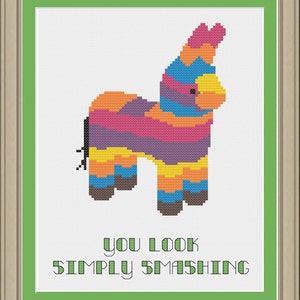 Może przedstawiać: Kolorowa piñata w kształcie osła z tekstem "You look simply smashing" pod spodem.