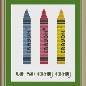 May include: Three crayons with smiling faces, each labelled "Crayon" in a different colour: blue, pink, and yellow. The text "We So Cray Cray" is below the crayons.